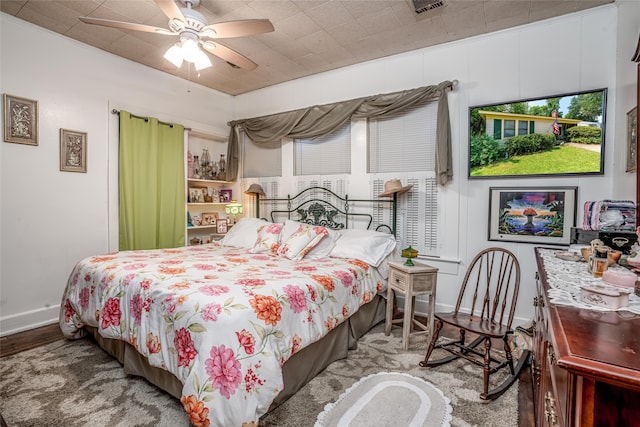 bedroom with ceiling fan and light hardwood / wood-style floors