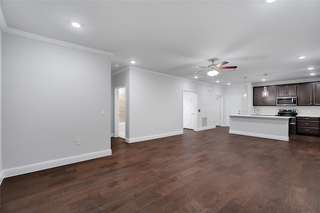 unfurnished living room with ceiling fan, ornamental molding, and dark wood-type flooring