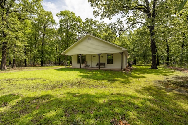 view of front of house featuring a porch and a front lawn