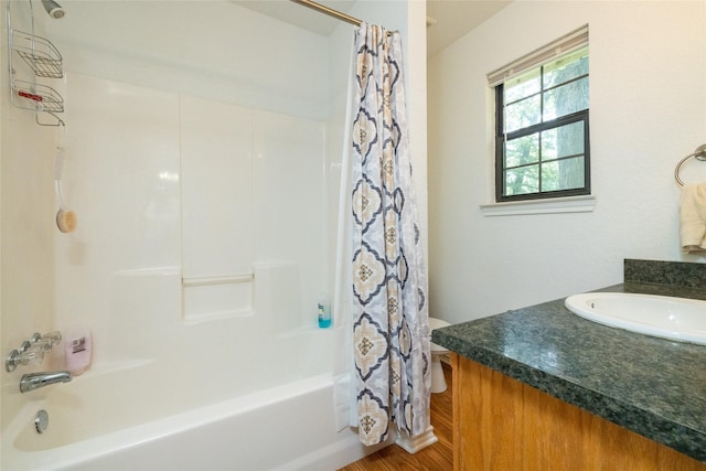 bathroom with vanity, shower / tub combo, and hardwood / wood-style flooring