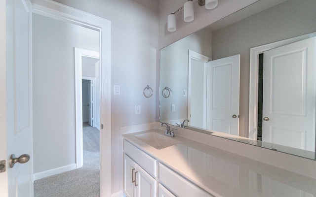 bathroom featuring vanity with extensive cabinet space