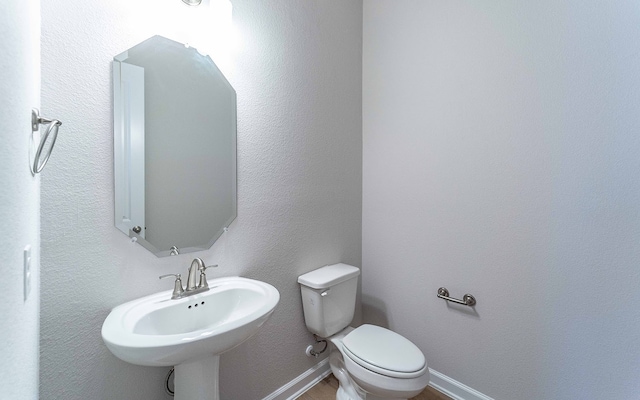 bathroom featuring toilet