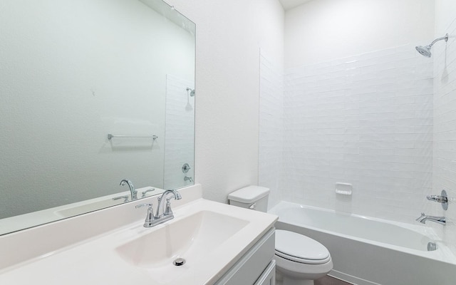 bathroom featuring shower / tub combination, vanity, and toilet