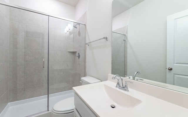 bathroom with oversized vanity and toilet