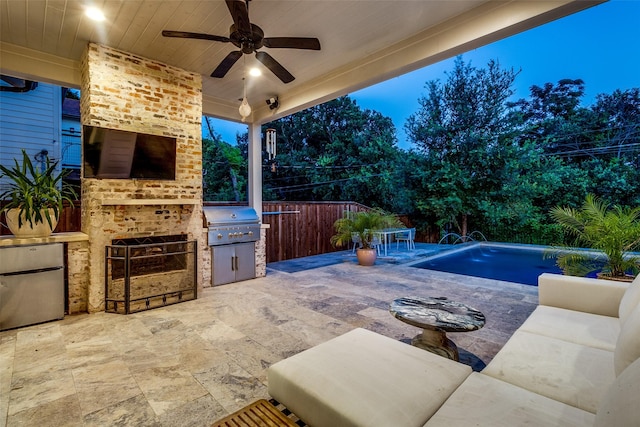 view of patio featuring a fenced in pool, ceiling fan, a fireplace, area for grilling, and pool water feature