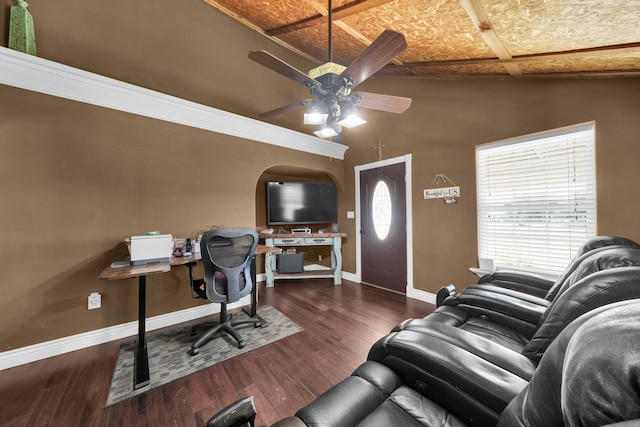 home office with dark wood-type flooring, coffered ceiling, ceiling fan, and ornamental molding