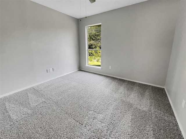 spare room featuring ceiling fan