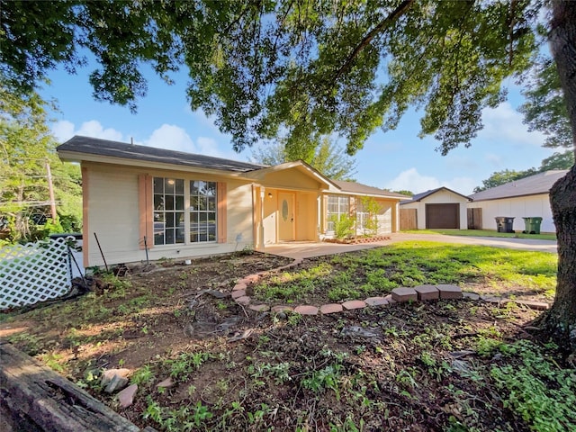 single story home featuring a garage