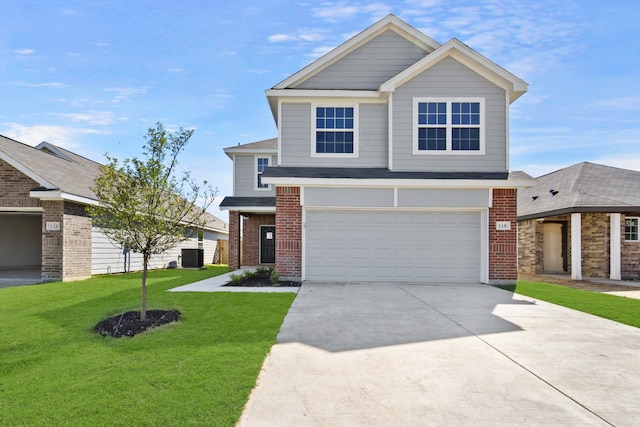 view of front of house featuring an attached garage, cooling unit, brick siding, driveway, and a front yard