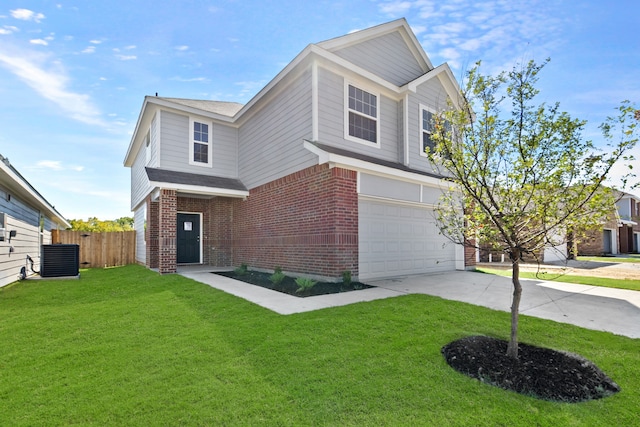 traditional-style home with central AC, brick siding, fence, concrete driveway, and a front yard