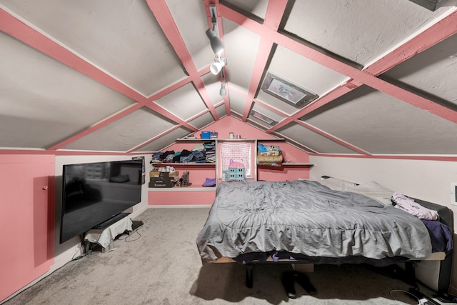 carpeted bedroom with vaulted ceiling