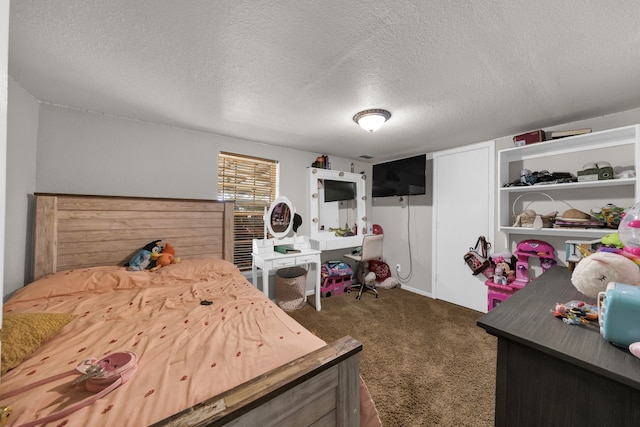 carpeted bedroom with a textured ceiling