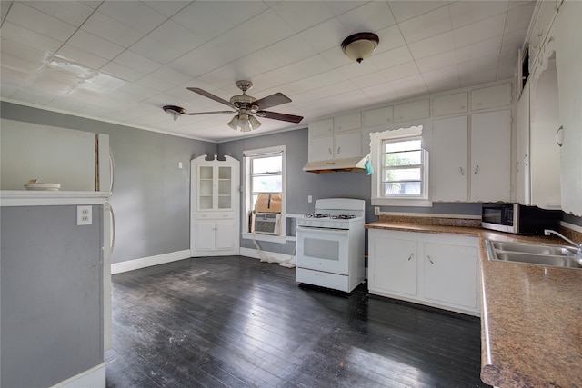 kitchen with dark hardwood / wood-style flooring, sink, white range with gas stovetop, and white cabinets