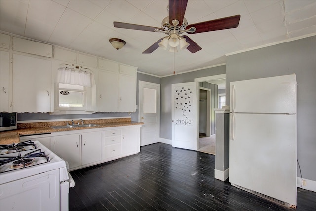 kitchen featuring ceiling fan, a sink, white appliances, dark wood finished floors, and ornamental molding