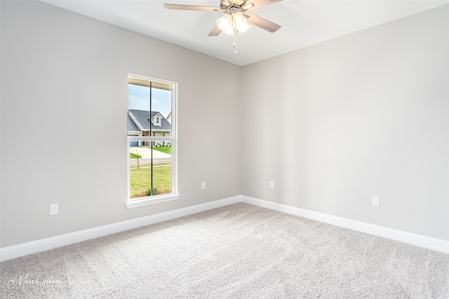 unfurnished room with carpet, plenty of natural light, and ceiling fan