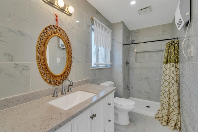 bathroom with tile walls, oversized vanity, toilet, a shower with shower curtain, and tile floors