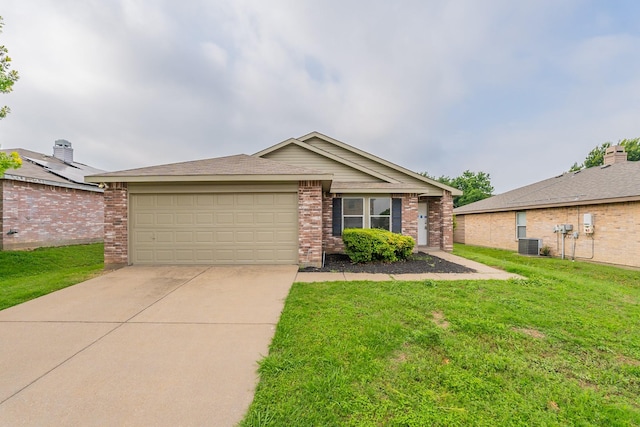 single story home featuring a front yard, a garage, and central air condition unit