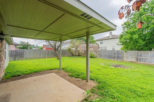 view of yard with a patio area