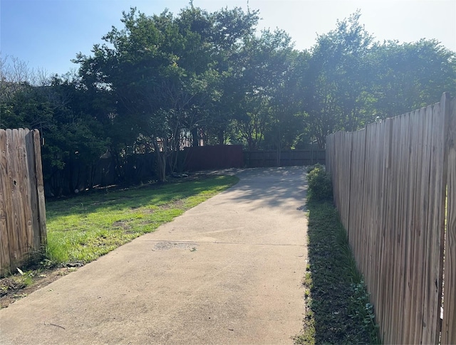 view of street featuring driveway