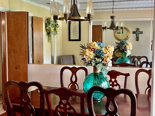 dining area with a notable chandelier