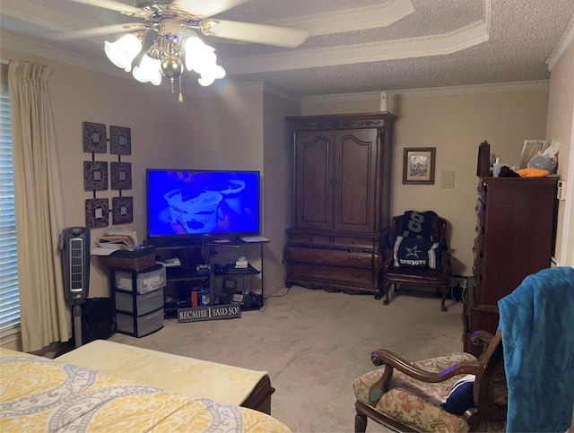 carpeted bedroom with crown molding, a textured ceiling, and ceiling fan