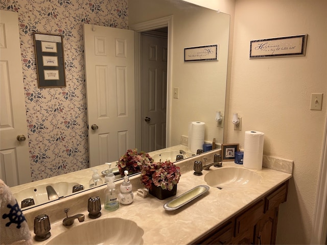 bathroom featuring dual bowl vanity