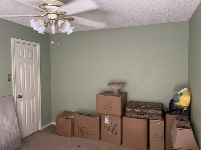 storage room with ceiling fan