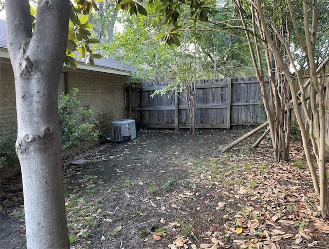 view of yard featuring central AC