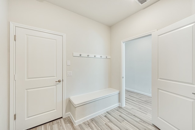 mudroom with light wood-type flooring