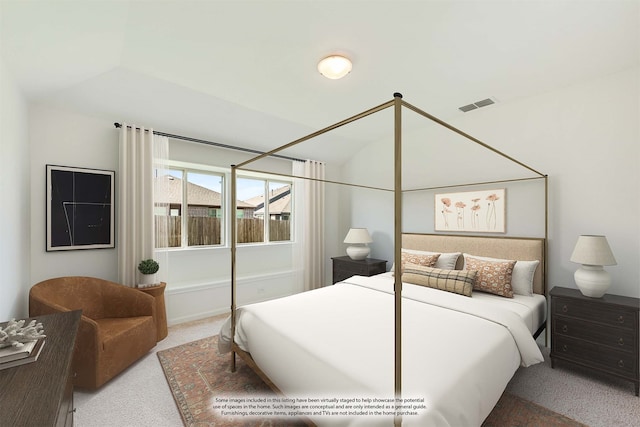 carpeted bedroom featuring vaulted ceiling