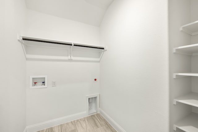 laundry room with electric dryer hookup, light wood-type flooring, and hookup for a washing machine