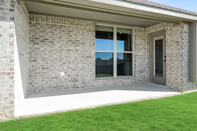 exterior space with a yard and a patio