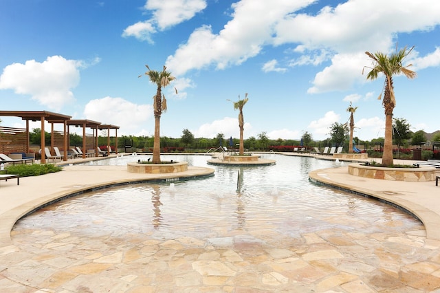 view of swimming pool featuring a patio