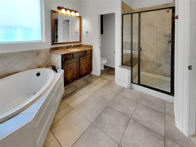 full bathroom featuring tile patterned flooring, vanity, toilet, and plus walk in shower