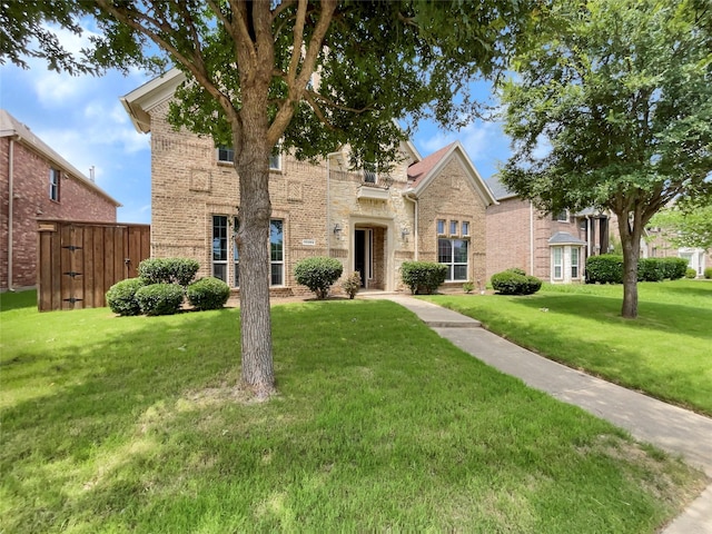 view of property featuring a front yard