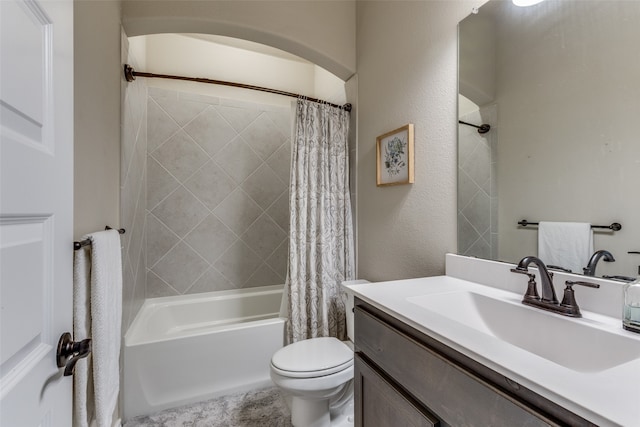 full bathroom with shower / tub combo, toilet, and vanity