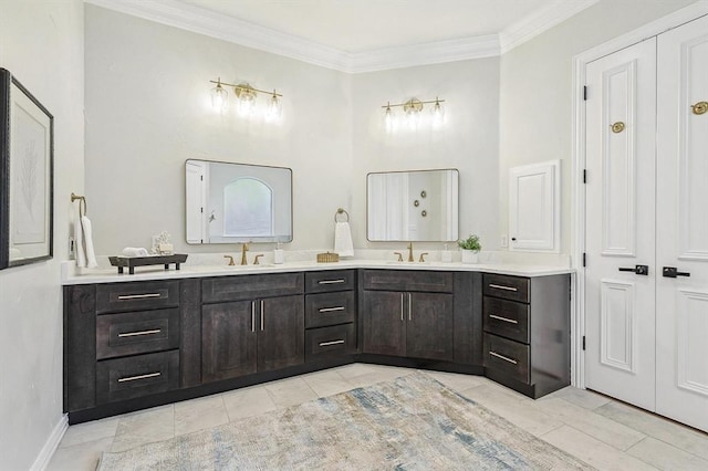 bathroom with vanity, tile patterned floors, and crown molding