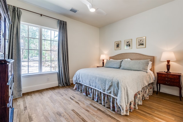 bedroom featuring ceiling fan and light hardwood / wood-style floors