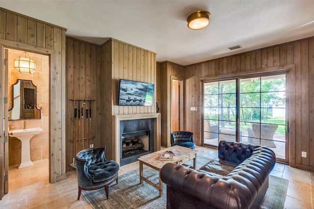 tiled living room with wooden walls