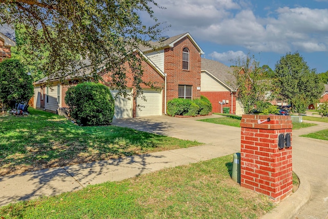 view of property featuring a front lawn