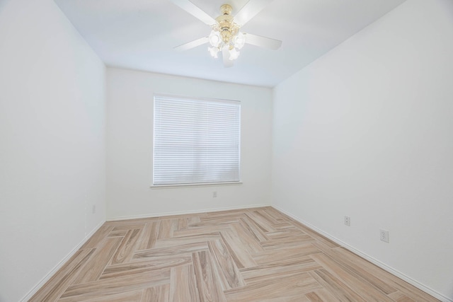 empty room with light parquet flooring