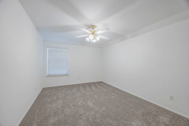 unfurnished room with carpet floors and ceiling fan