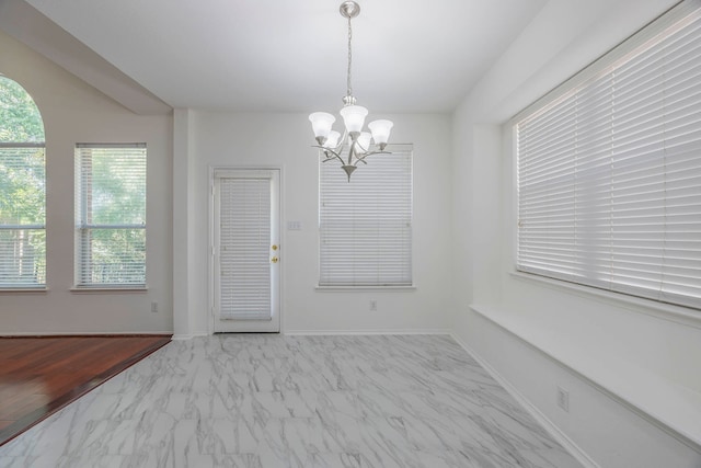 interior space with a chandelier