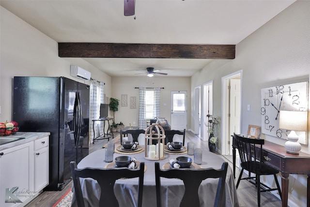 dining space featuring a wall mounted air conditioner, light hardwood / wood-style flooring, beam ceiling, and ceiling fan