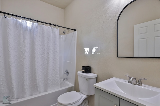 full bathroom featuring vanity, toilet, and shower / bathtub combination with curtain