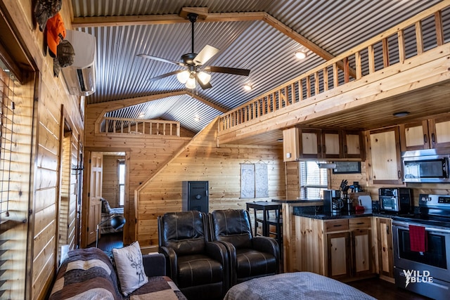 kitchen featuring high vaulted ceiling, wooden walls, ceiling fan, appliances with stainless steel finishes, and dark hardwood / wood-style flooring