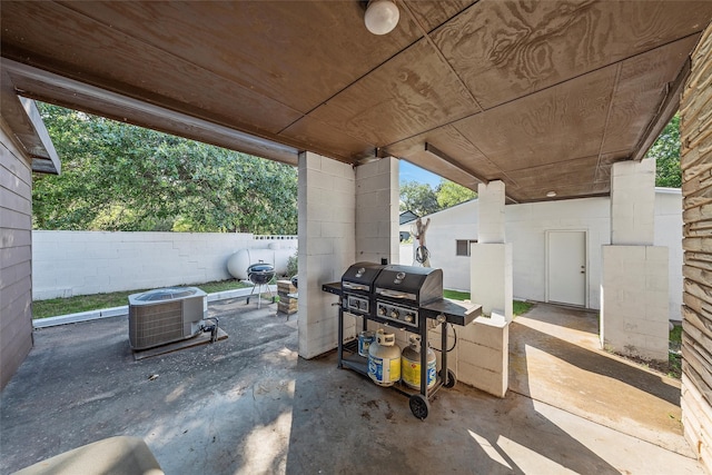 view of patio featuring cooling unit and grilling area