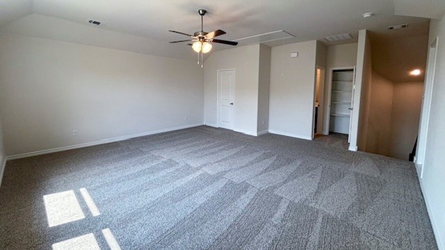 unfurnished bedroom featuring carpet floors, ceiling fan, and lofted ceiling