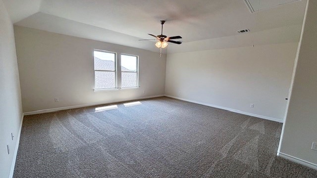 unfurnished room with ceiling fan, carpet, and lofted ceiling