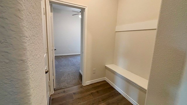 mudroom with ceiling fan and dark hardwood / wood-style flooring